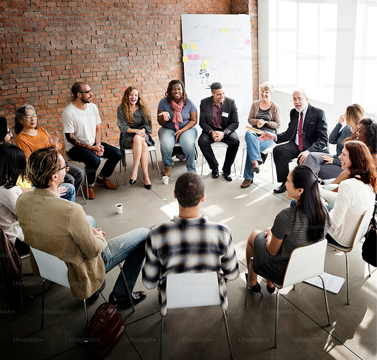 Community group meeting in a circle