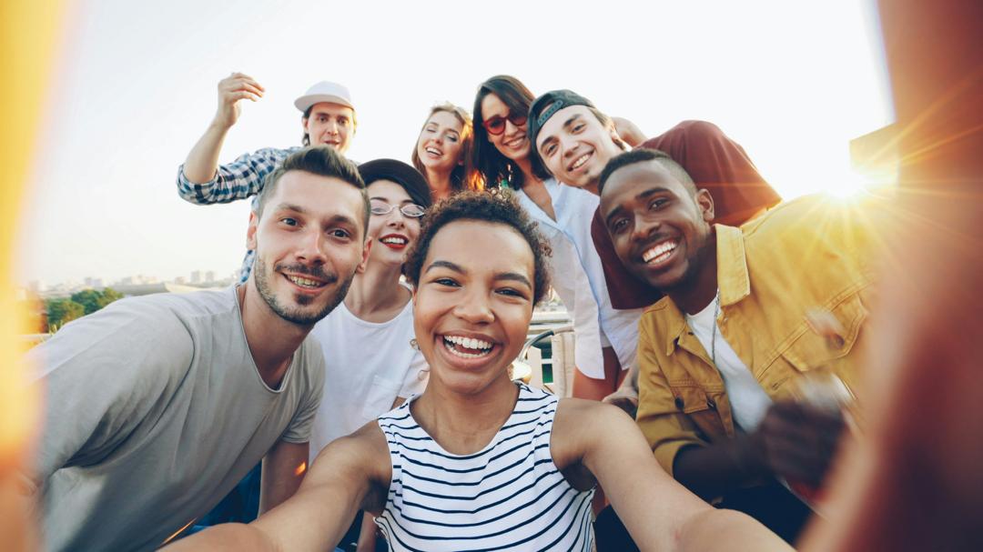Community members smiling outdoors